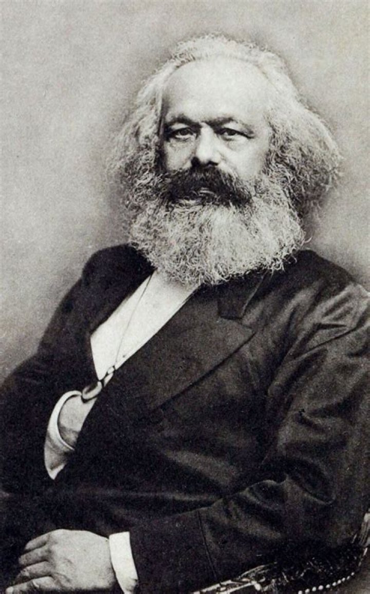 What did Karl Marx believe about revolution?